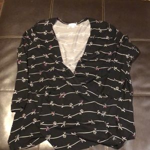 Black Caroline with white and pink heart strings